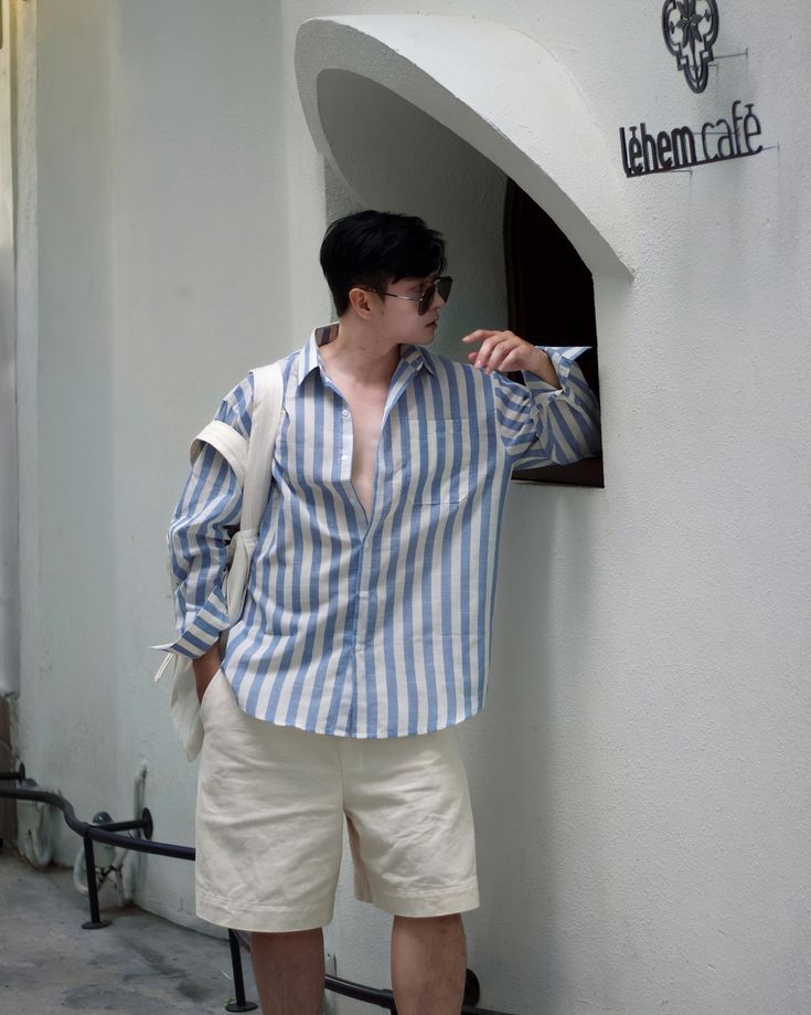 a man in a striped shirt